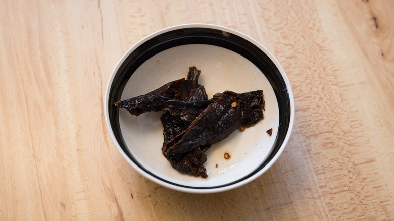 rehydrated ancho chiles in bowl