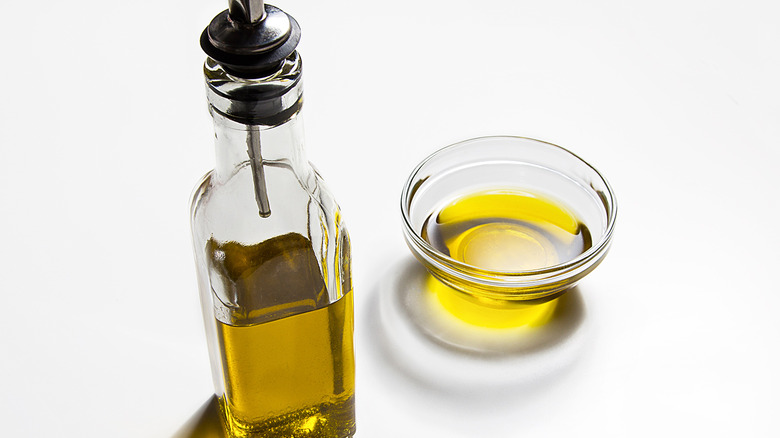 bottle and bowl of olive oil