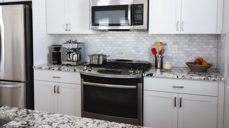 kitchen with white cabinets and stainless steel appliances