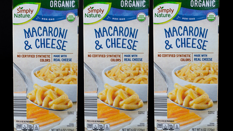Three boxes of Simply Nature brand macaroni and cheese with no synthetic colors