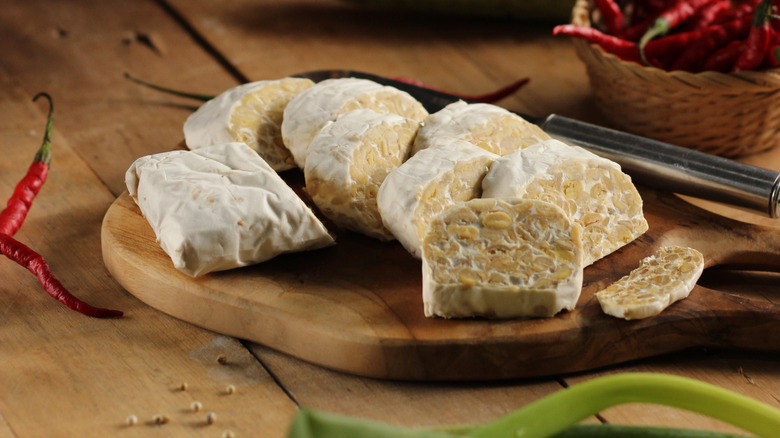 Fresh tempeh on wood board