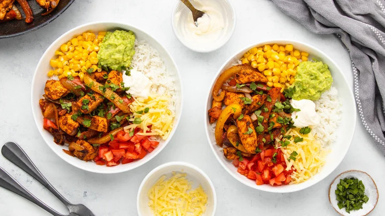 Loaded Chicken Fajita Bowl in two white bowls