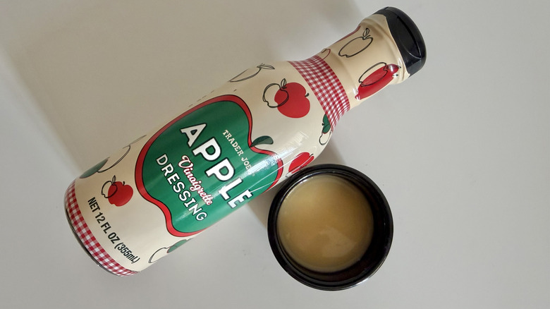 A bottle of Apple Vinaigrette Dressing on a table