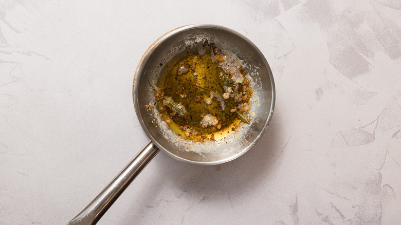 Brown butter and fried sage in pan