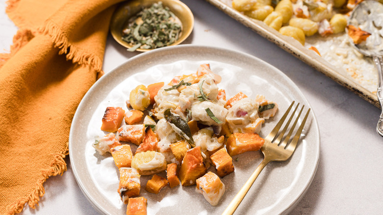 A plate of gnocchi and butternut squash bake