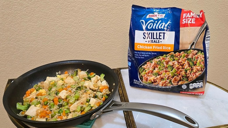 Skillet and bag of Birds Eye Voila! Chicken Fried Rice.