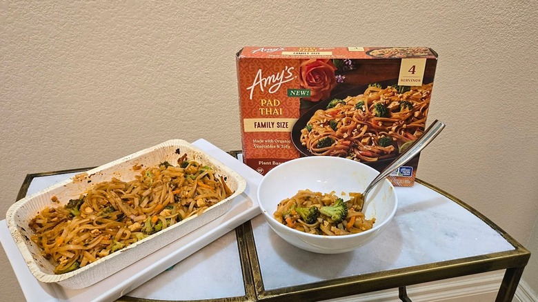 Bowl, container, and box of Amy's Kitchen Pad Thai.