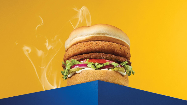 Culver's Smoked Cheddar CurderBurger on a blue table.