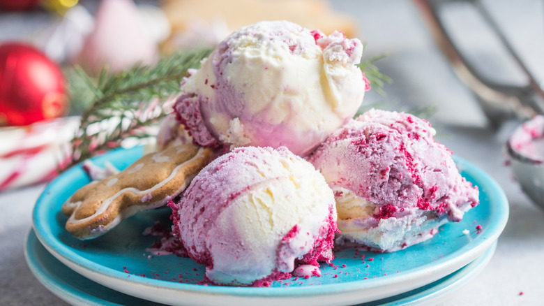 scoops of pink peppermint ice cream on plate