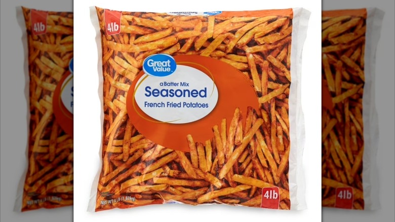 A mirrored image of a bag of Great Value Seasoned Fries on a white background