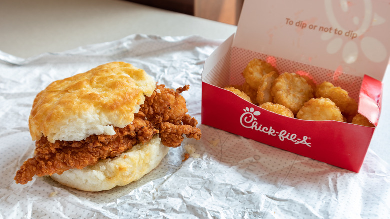 Chicken biscuit breakfast sandwich and box of hash browns from Chick-fil-A