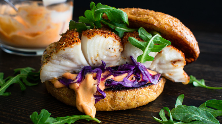 Halibut sandwich arugula cabbage buns