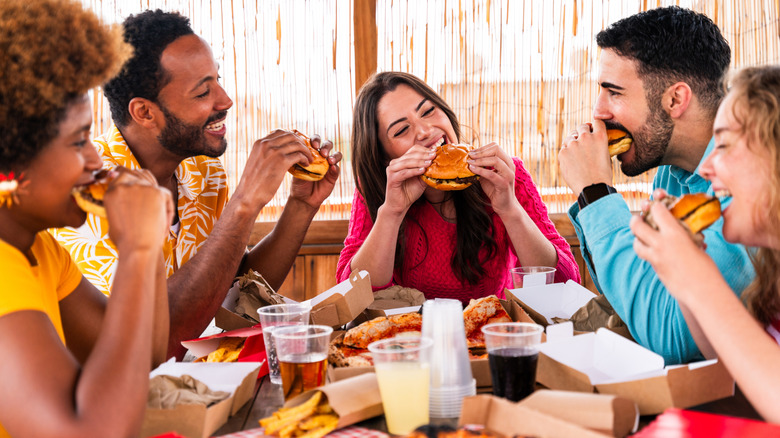 Friends enjoying fast food