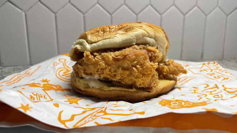 Popeyes fried chicken sandwich on a plate