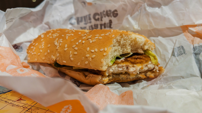 Birger King chiecken sandwich with a bite taken out