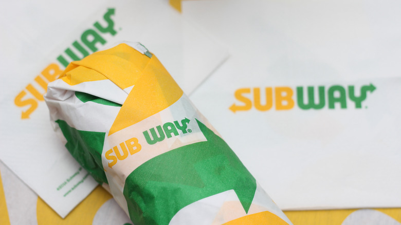 Wrapped Subway sub with napkins
