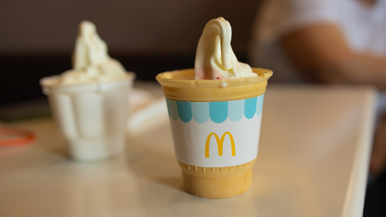 McDonald's cone and sundae on a table