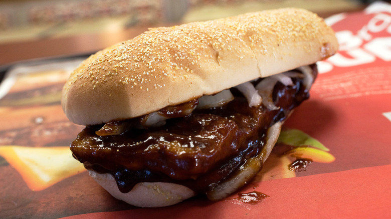 McDonald's McRib on tray with paper