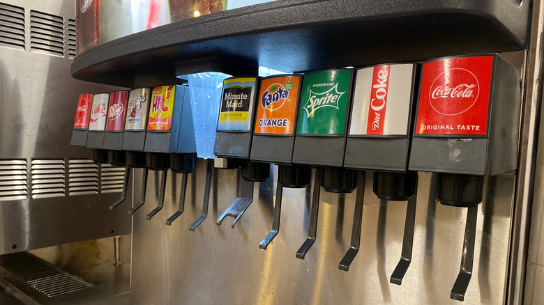 Fast food soda machine with Coca-Cola products