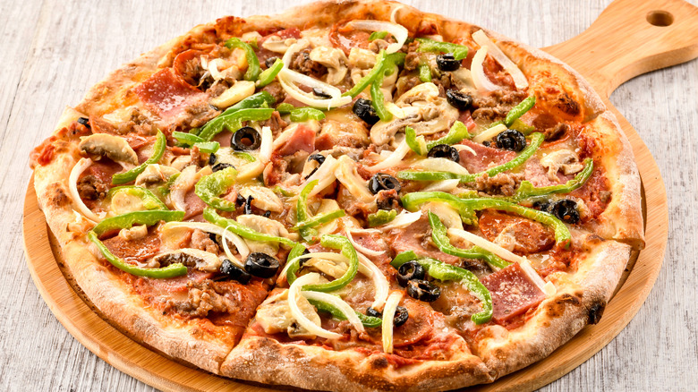 Generic supreme pizza with lots of toppings