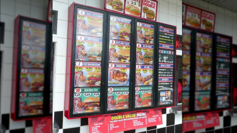 A red menu board under the regular Checkers and Rally's menu board featuring the Double Value Menu.