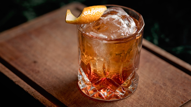 whiskey with ice and orange peel