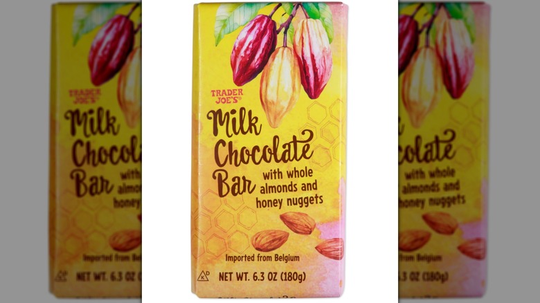 Trader Joe's Milk Chocolate Bar with Almonds and Honey Nuggets on a white background