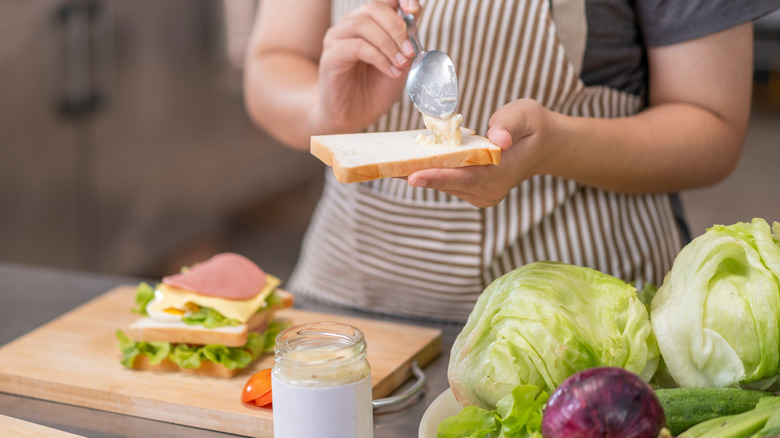 person making a sandwich