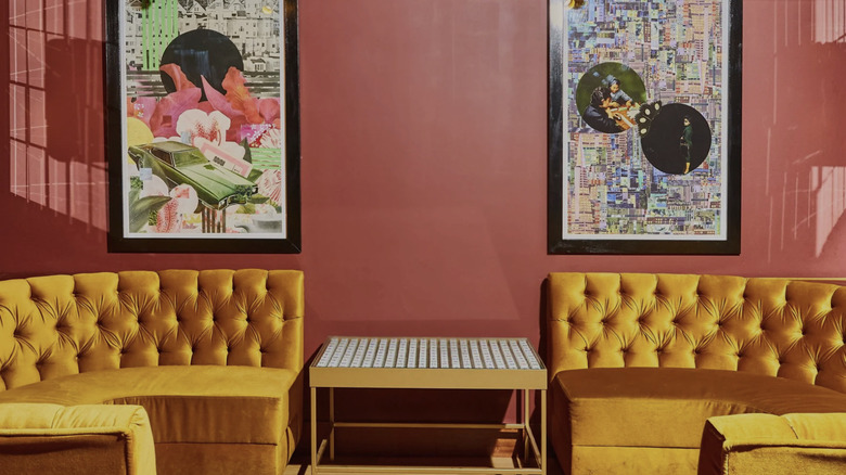 two sofas and wall art at The Felix