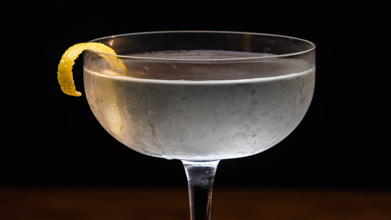 A perfect Vesper martini in a coup glass with a lemon twist