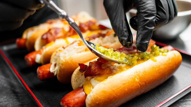 hot dogs with different toppings