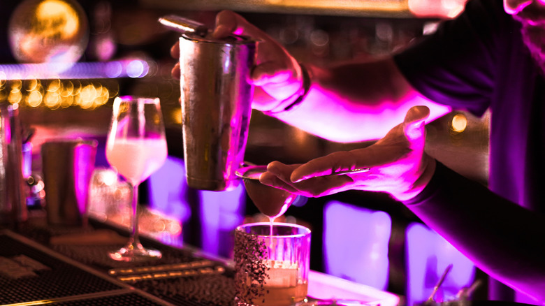 Bartender mixing cocktails