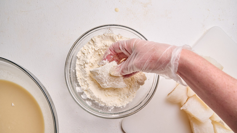 dredging fish in flour