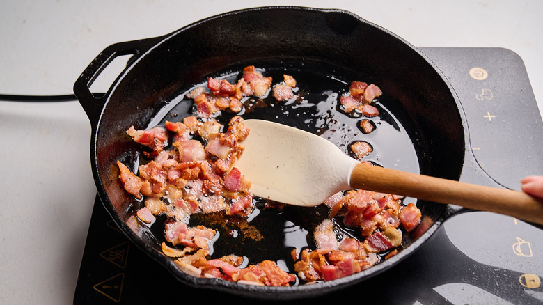 bacon browned in a skillet