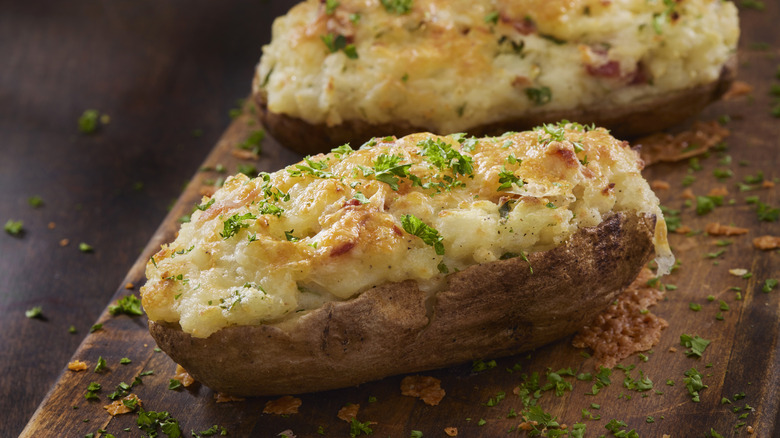 baked potato with butter cheese and herbs