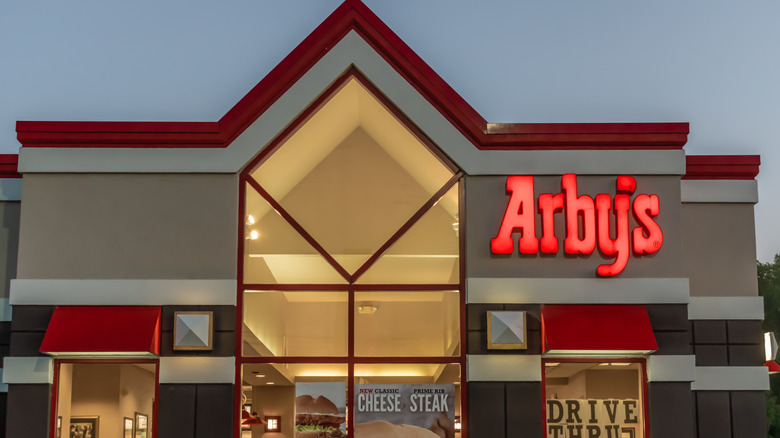 Exterior of Arby's restaurant at evening