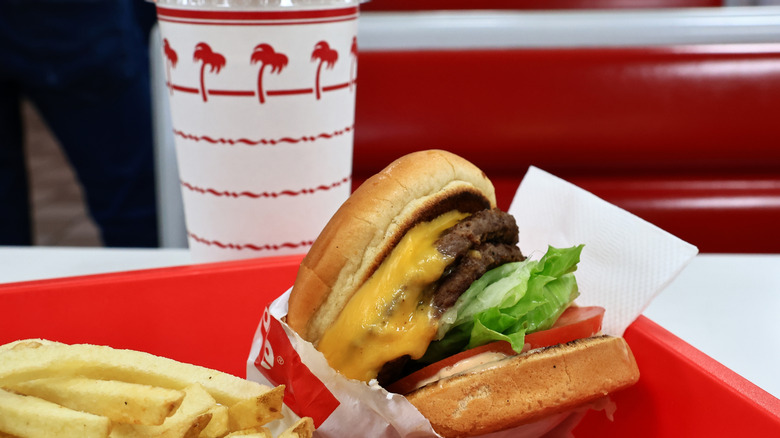In-N-Out double double burger and fries and drink on tray