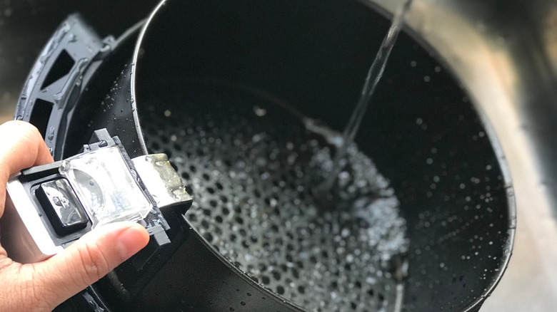 Water splashing into air fryer