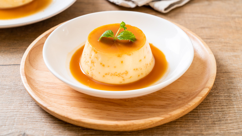 A flan garnished with a mint sprig