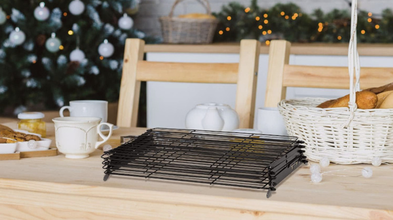 Folded cooling rack on kitchen table at Christmas