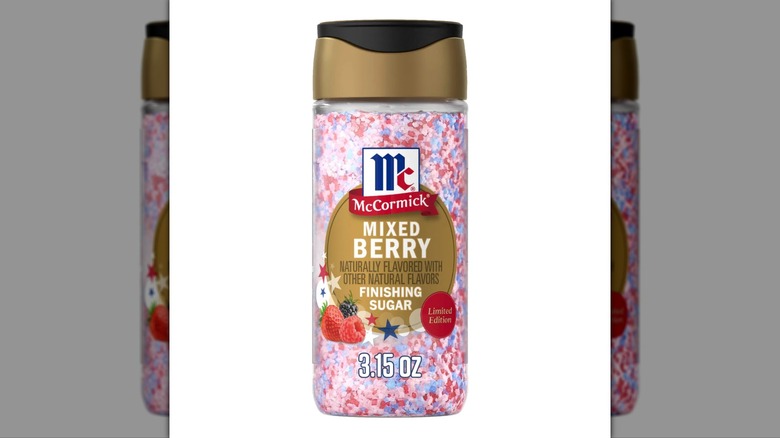 Bottle of McCormick Mixed Berry Finishing Sugar on a white background