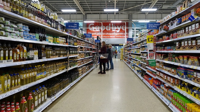 Shoppers at a Tesco in London
