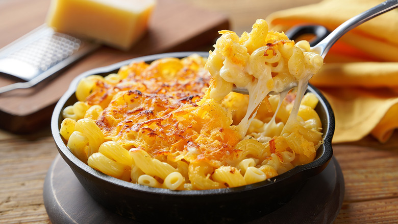 Close-up of cast iron dish of mac and cheese