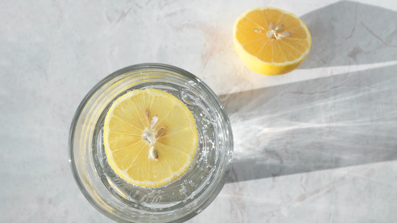 Lemon water on gray countertop