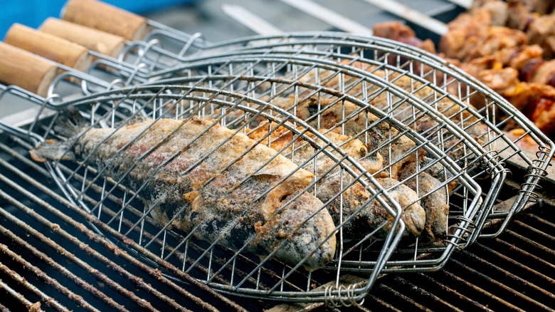 Whole fish in fish-shaped grill baskets