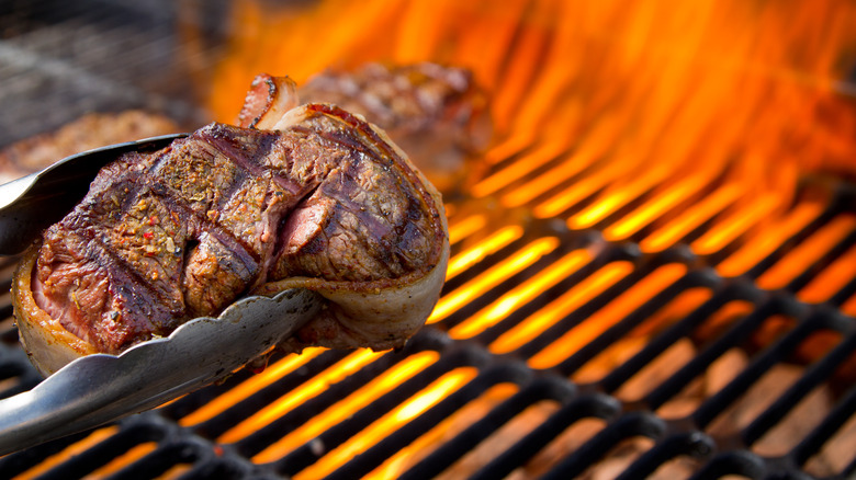 seared steak on grill