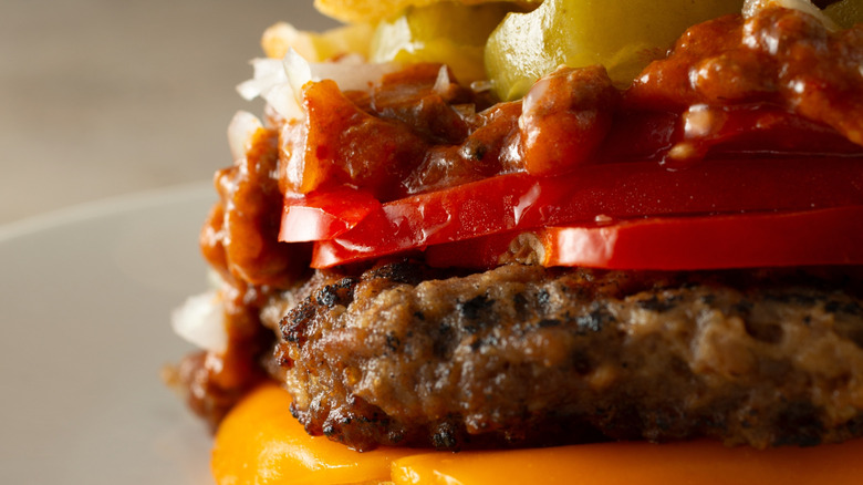 closeup of a chili cheeseburger