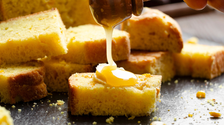Honey dripped onto cornbread