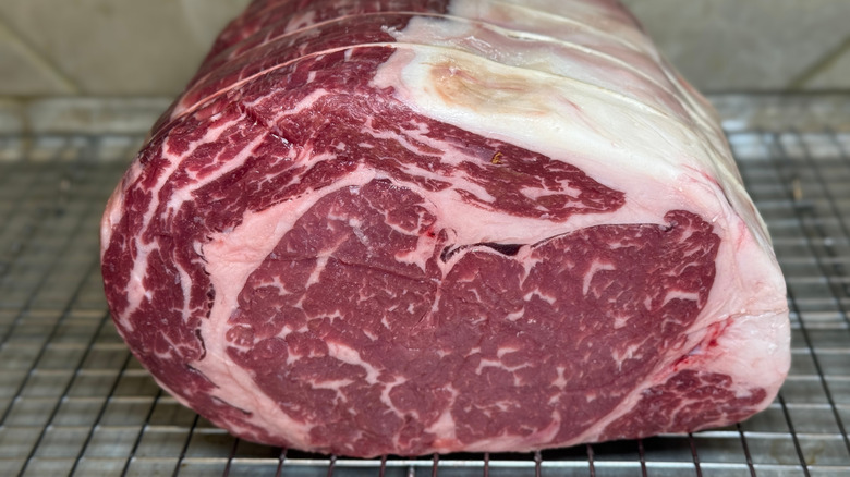 Prime rib roast on a rack