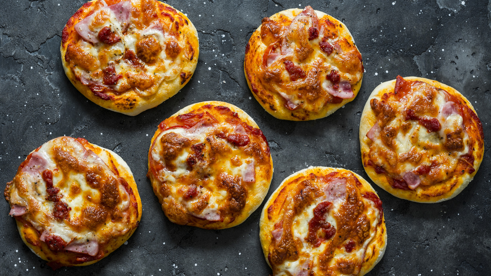 For Cheaper Homemade Pizza, Grab Canned Biscuits And A Mug - Tasting Table